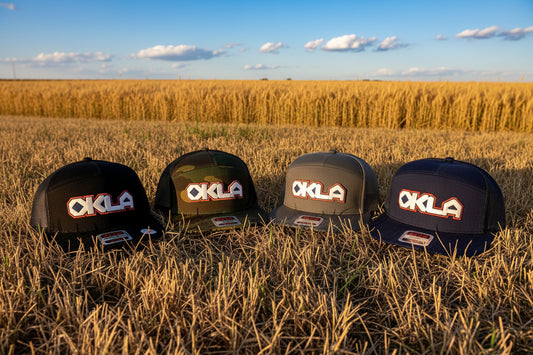 OKLA Southwest Geometric Patch 7 Panel Trucker Hat | Oklahoma Inspired Snapback Cap | Flat Bill Mesh Hat | Black Camo Navy Charcoal