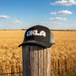 Black trucker cap with 'OKLA' logo on a white background