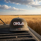 Gray cap with 'OKLA' logo on a white background