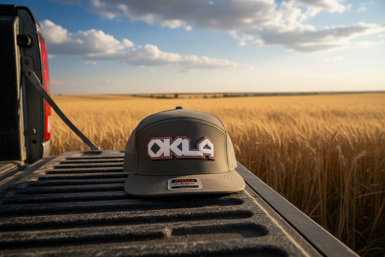 Gray cap with 'OKLA' logo on a white background