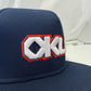 Oklahoma OKLA 3D Puff Embroidered 5 Panel Snapback Hat | Oklahoma Inspired Flat Bill Cap | Black or Navy Structured Streetwear Hat