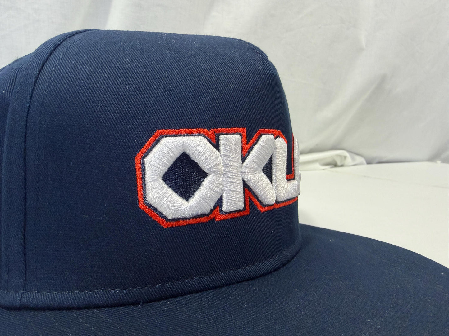Oklahoma OKLA 3D Puff Embroidered 5 Panel Snapback Hat | Oklahoma Inspired Flat Bill Cap | Black or Navy Structured Streetwear Hat