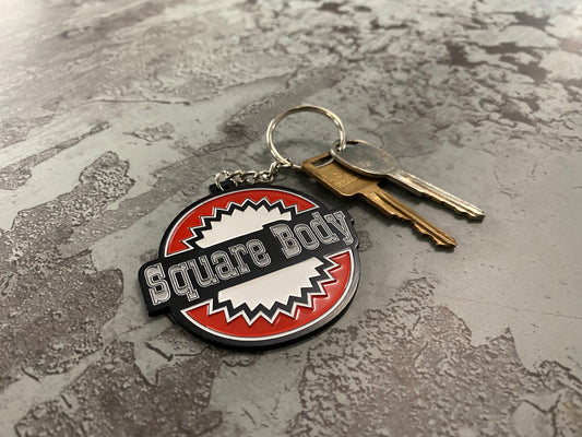 Square Body Round - Metal Keychain Chevy Chevrolet - Stamped Metal Enamel Paint Fill - 2.5 Inches - Oklahoma Customs Original Design